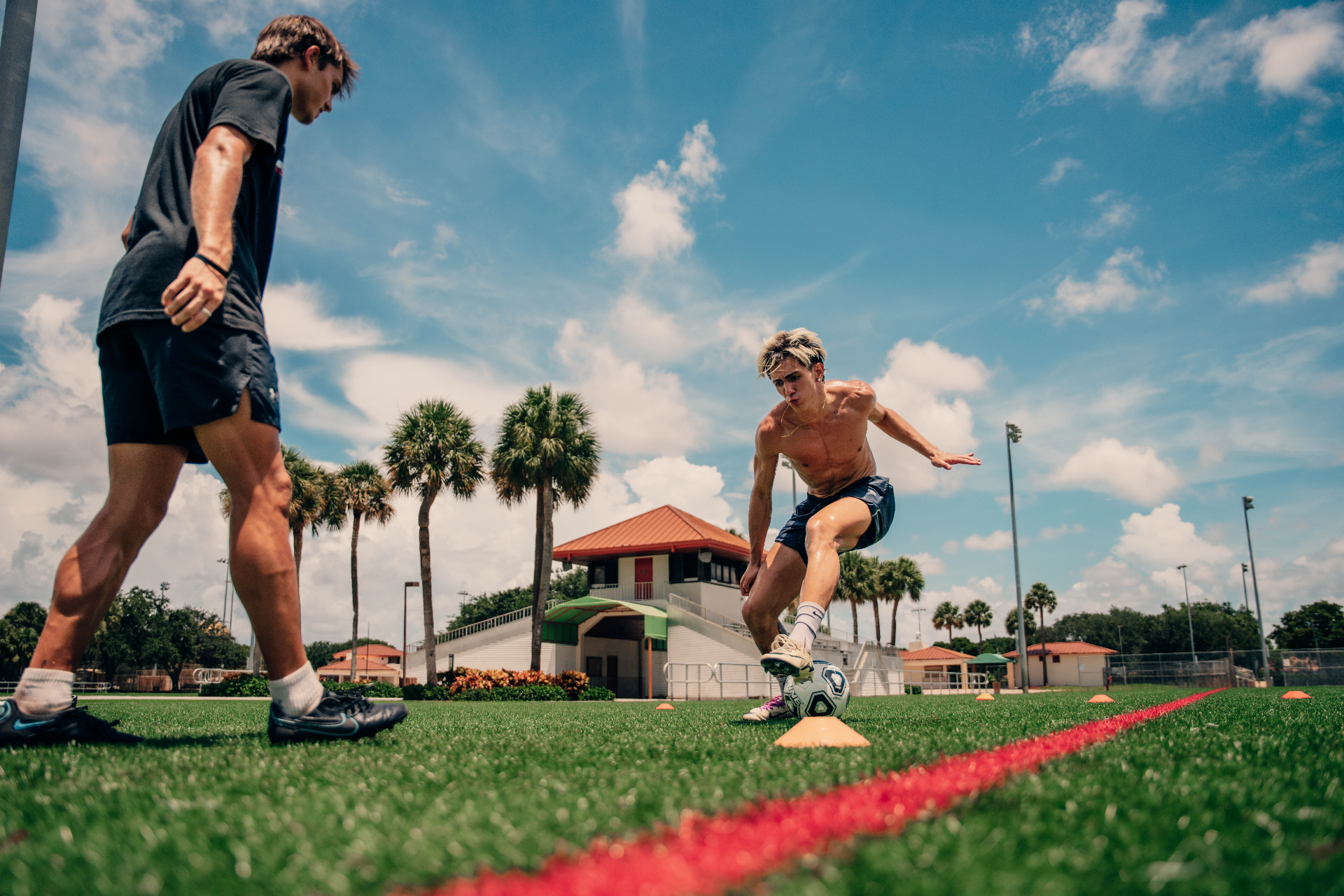 Young soccer player training at golden hour in South Florida